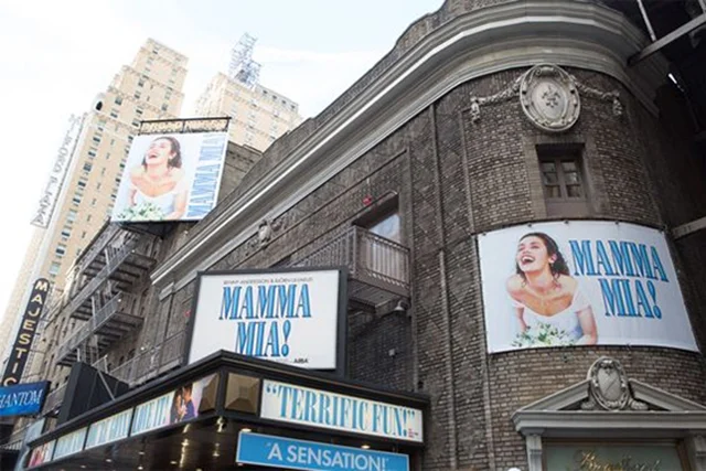 Close up of a MAMMA MIA! Poster on side of Broadhurst Theatre on Broadway