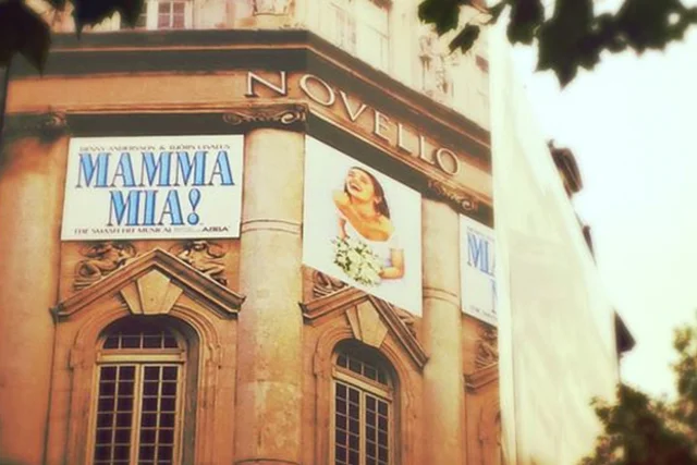 Close up of a MAMMA MIA! Poster on side of the Novello Theatre, london